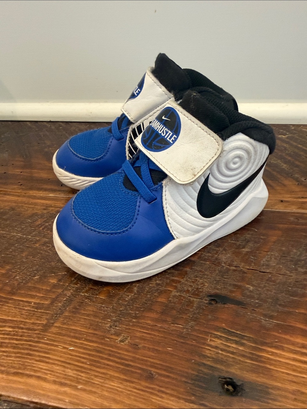 Nike Kids Blue, White and Black Hustle Basketball Sneakers